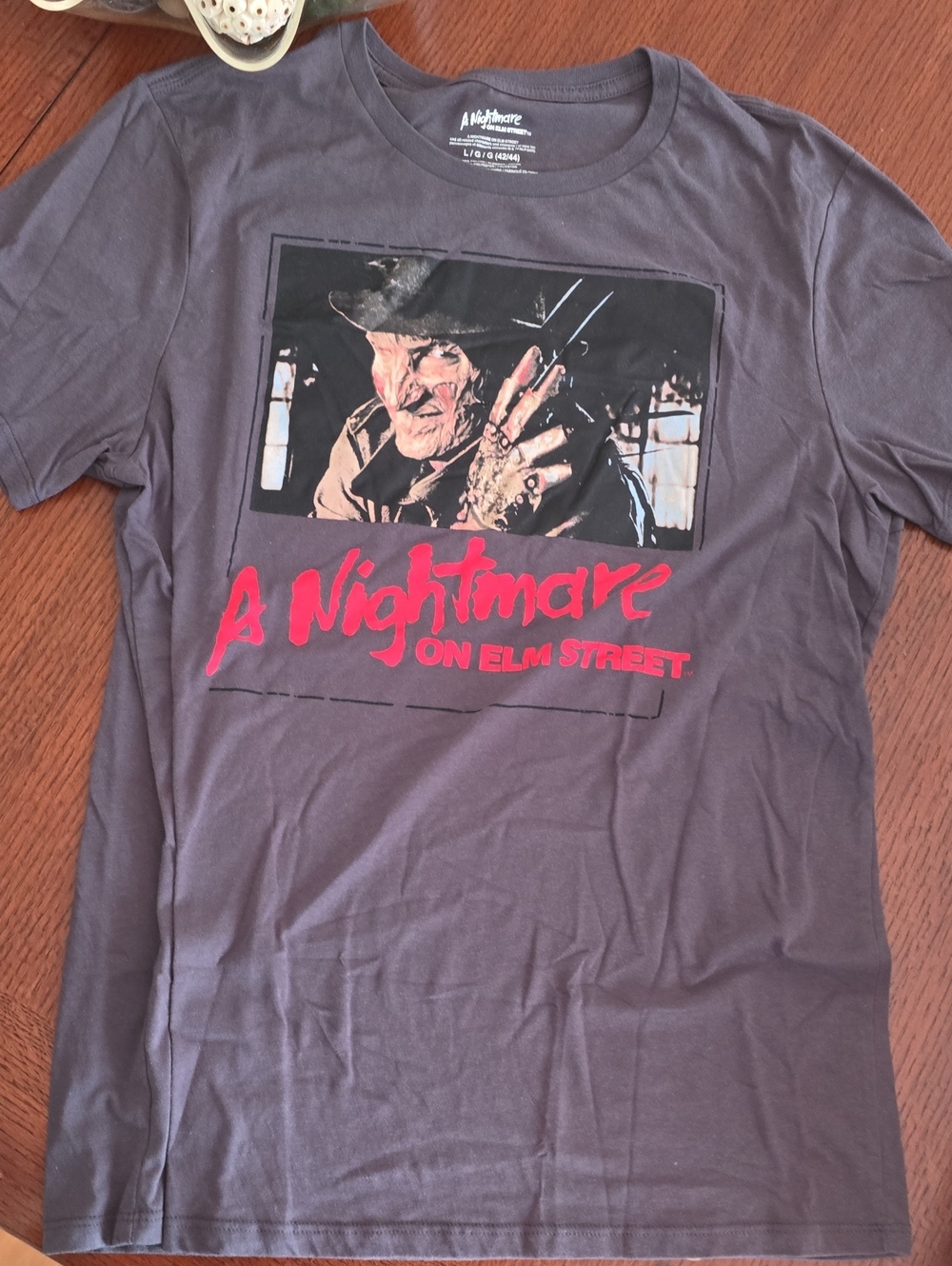 A Nightmare on Elm Street Graphic Tee — Charcoal with Red Script